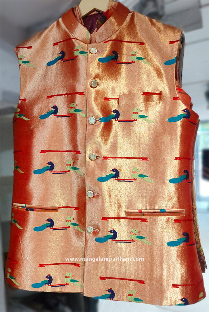 A sleeveless peacock design paithani jacket for men with golden color