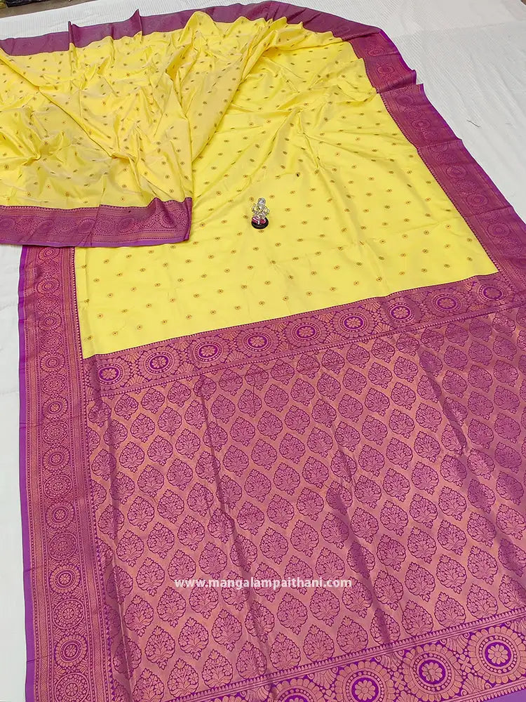 yellow paithani kanjivaram saree