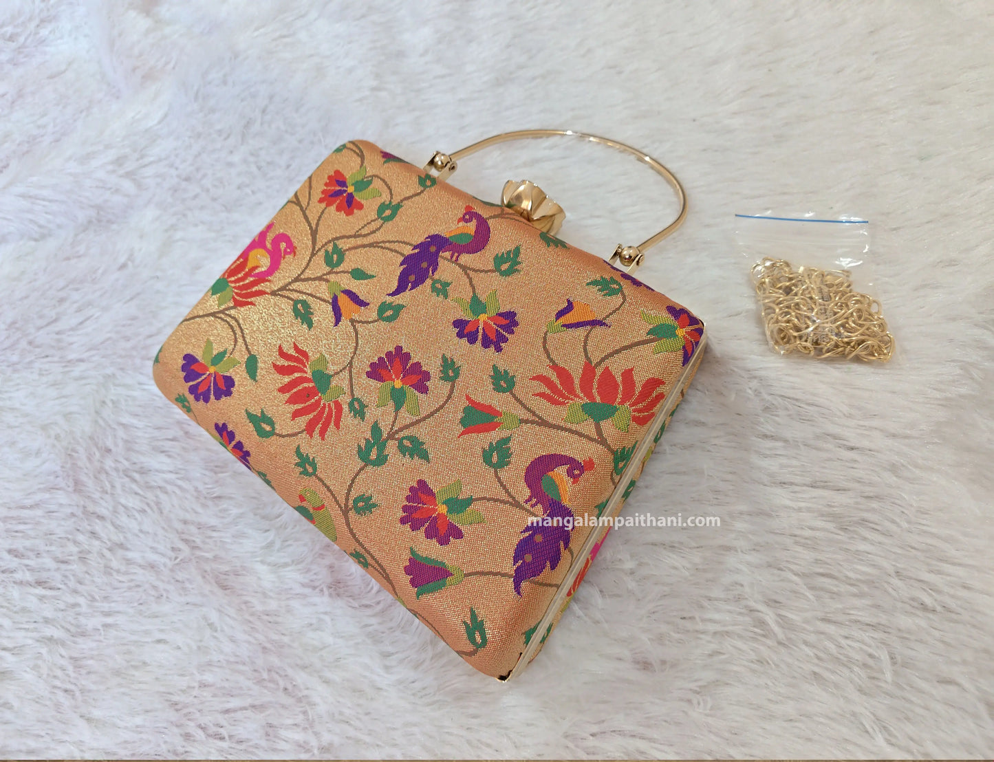 Golden Paithani clutch bag with multicolor peacock design