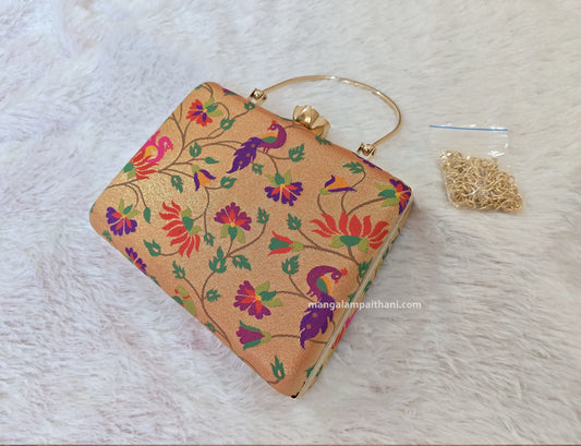 Golden Paithani clutch bag with multicolor peacock design