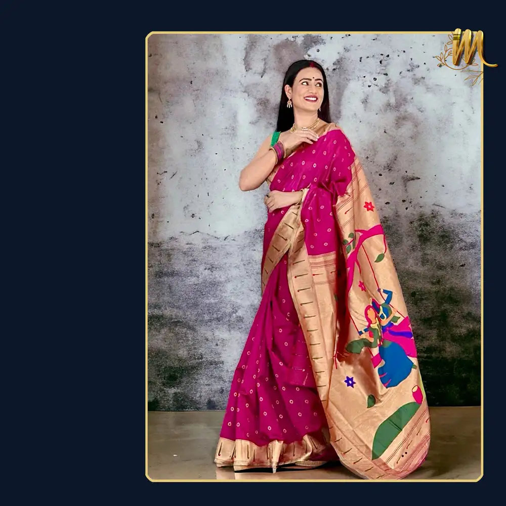 Woman wearing a vibrant pink paithani saree