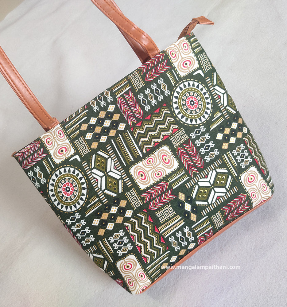 A multicolor handbag with geometric patterns