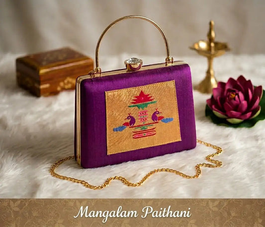Purple Paithani clutch with traditional design
